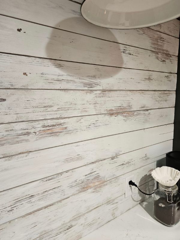 Distressed white shiplap as the back of a customized coffee bar in a Hays, Kansas home addition.